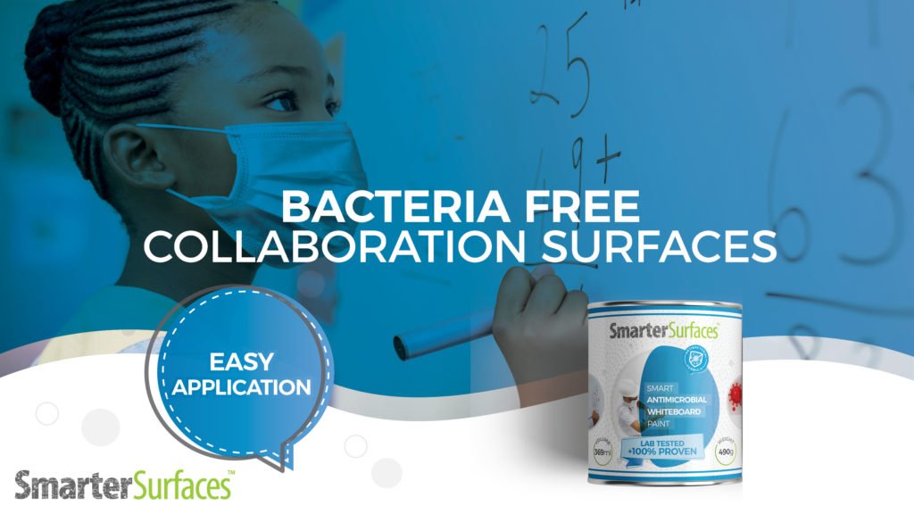 Antimikrobiyal Beyaz Yazı Tahtası Boyası - Smarter Surfaces TR Antimikrobiyal-Yazı Tahtası-Boyası ile hazırlanmış-yazılır ve kuru silinir duvarda-marker ile yazan kadın